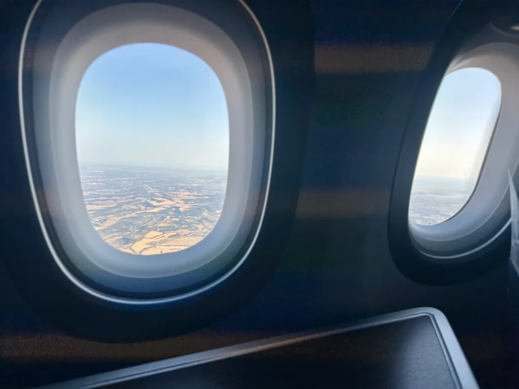 a view of a city from an airplane window