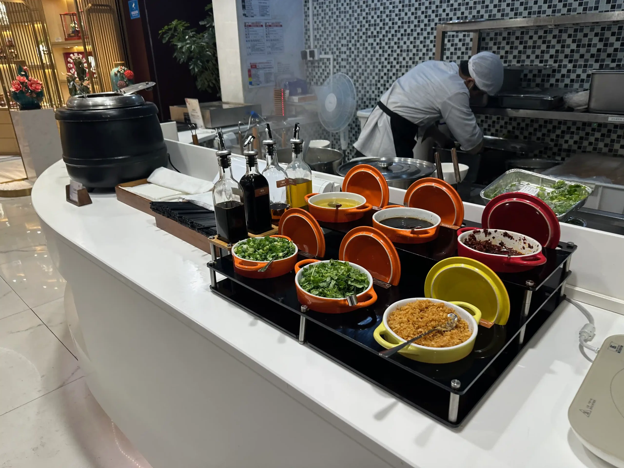 a chef cooking food in a kitchen