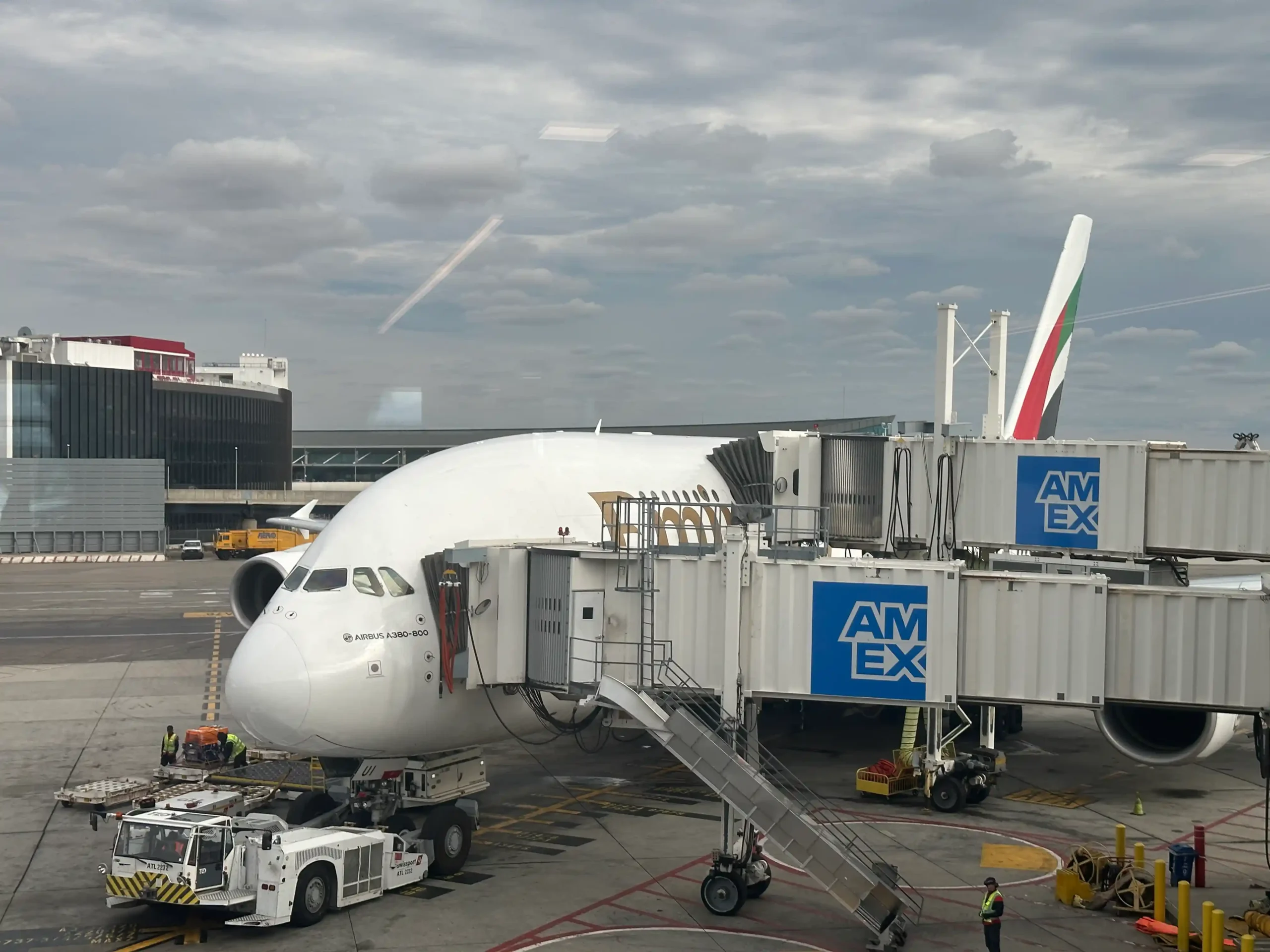 a plane being loaded with luggage