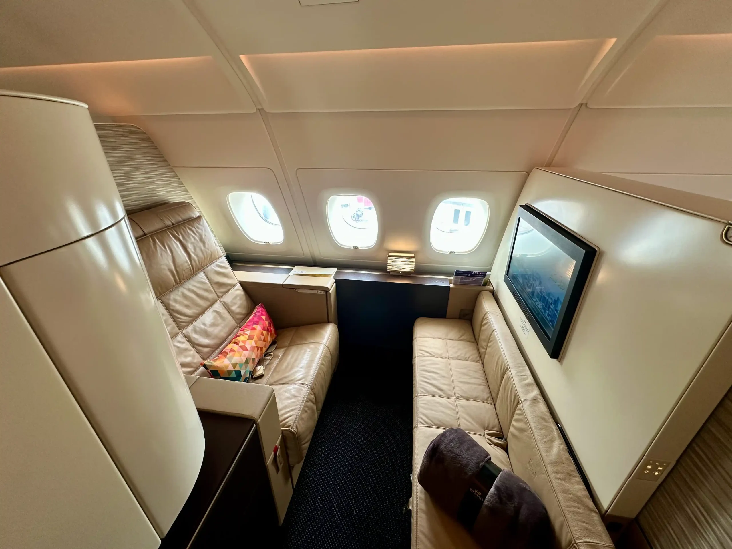 a seat and window in an airplane