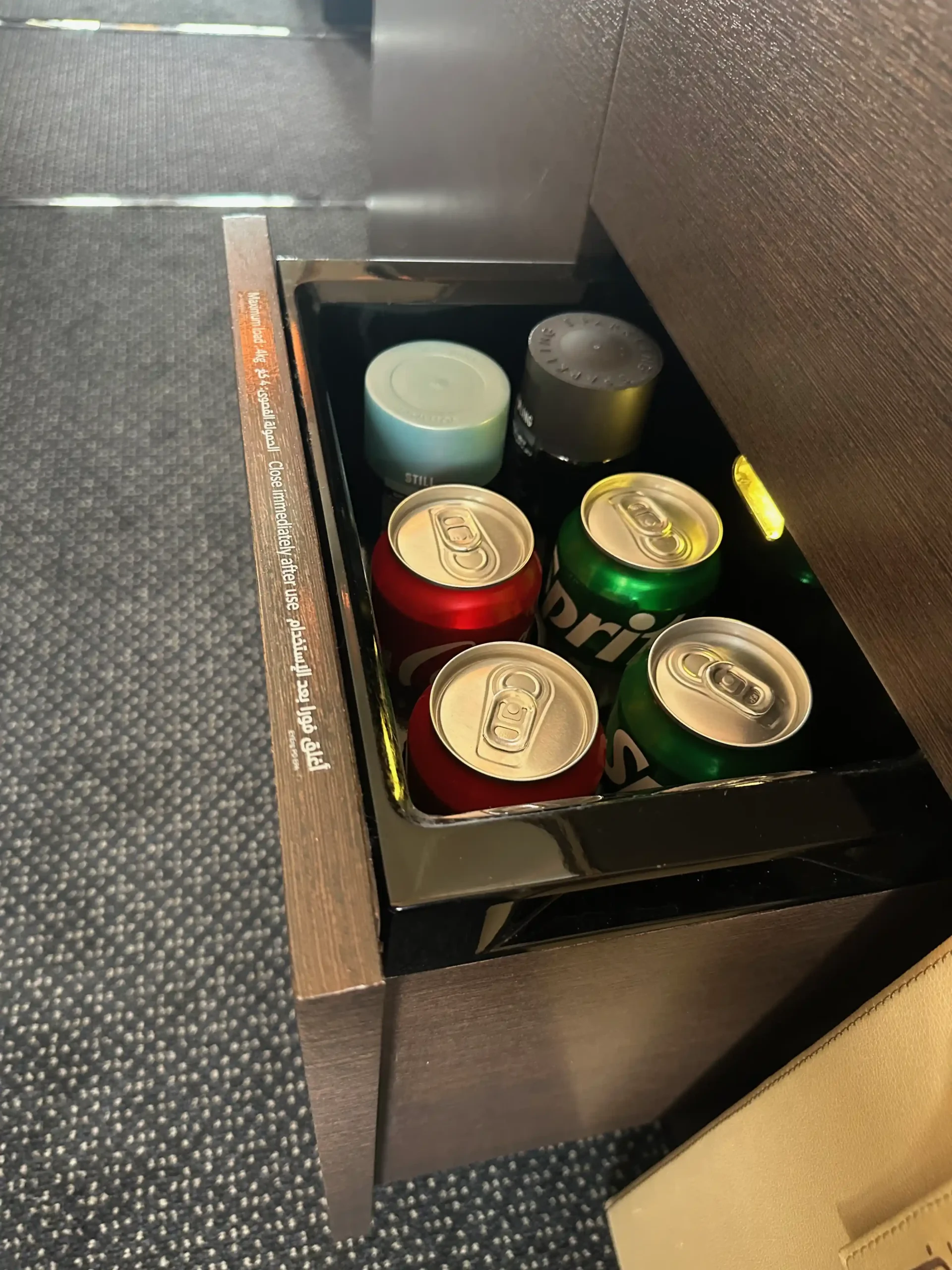 a can of soda in a drawer