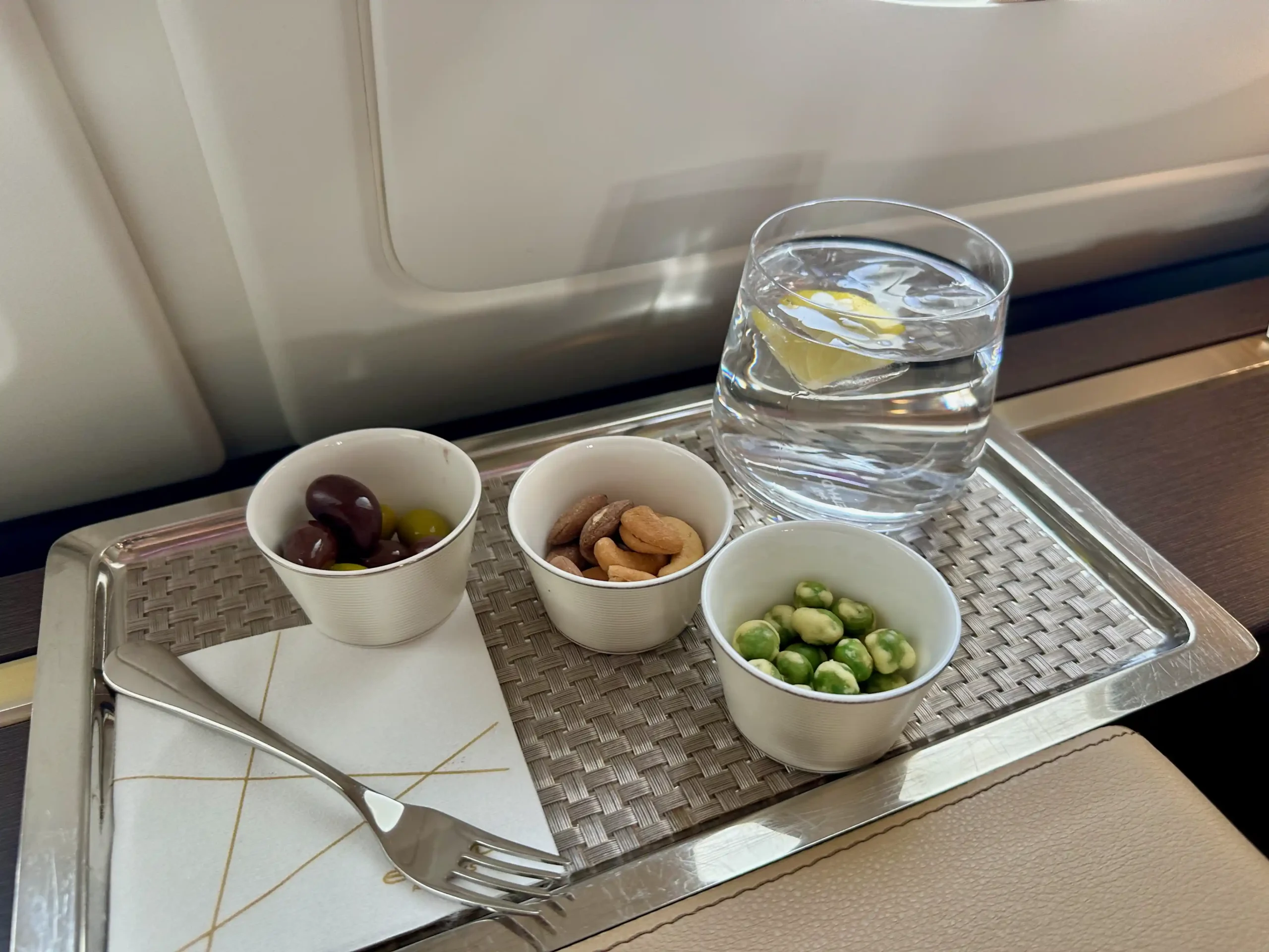 food in small bowls on a tray