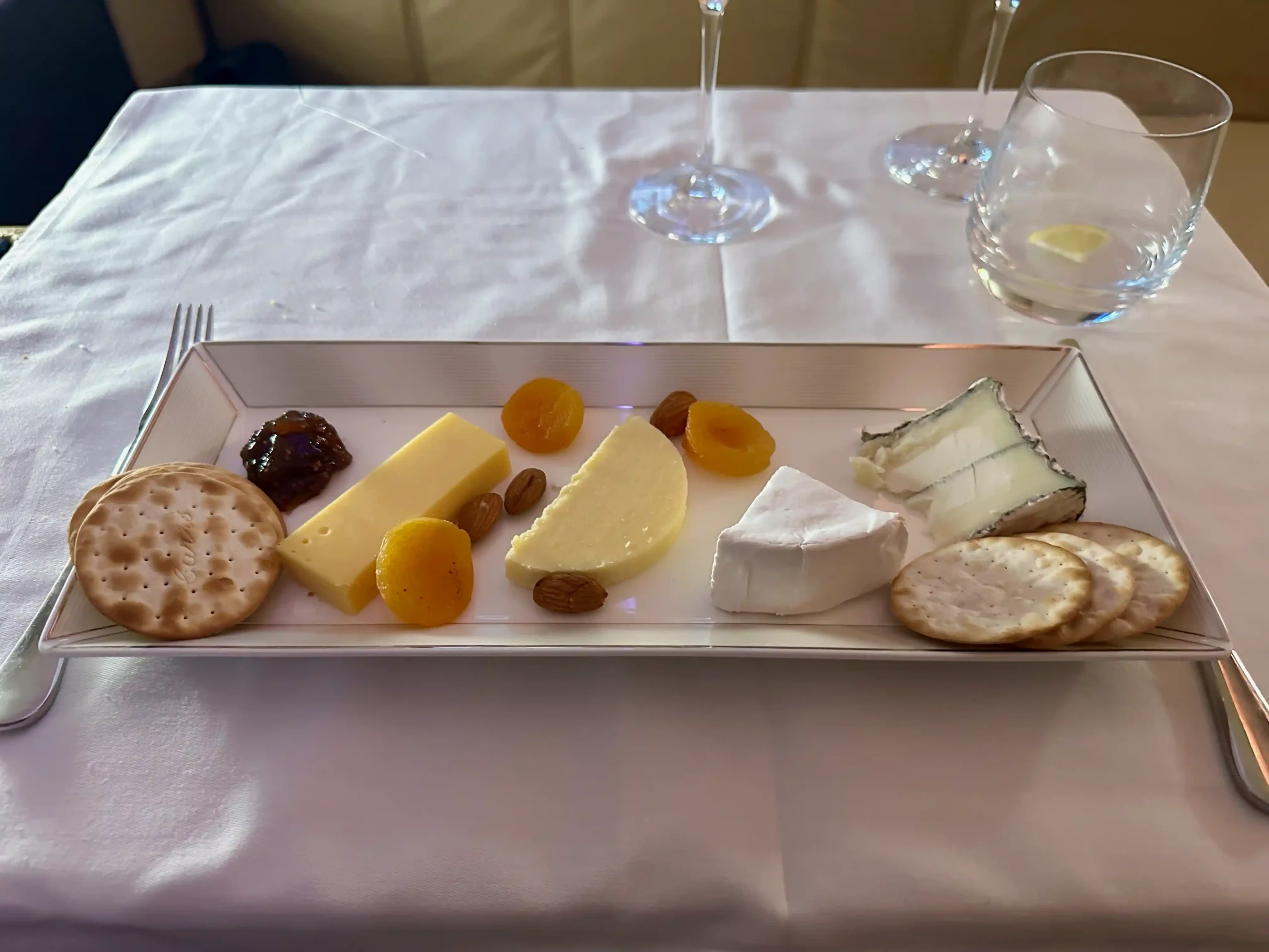 a plate of cheese and crackers