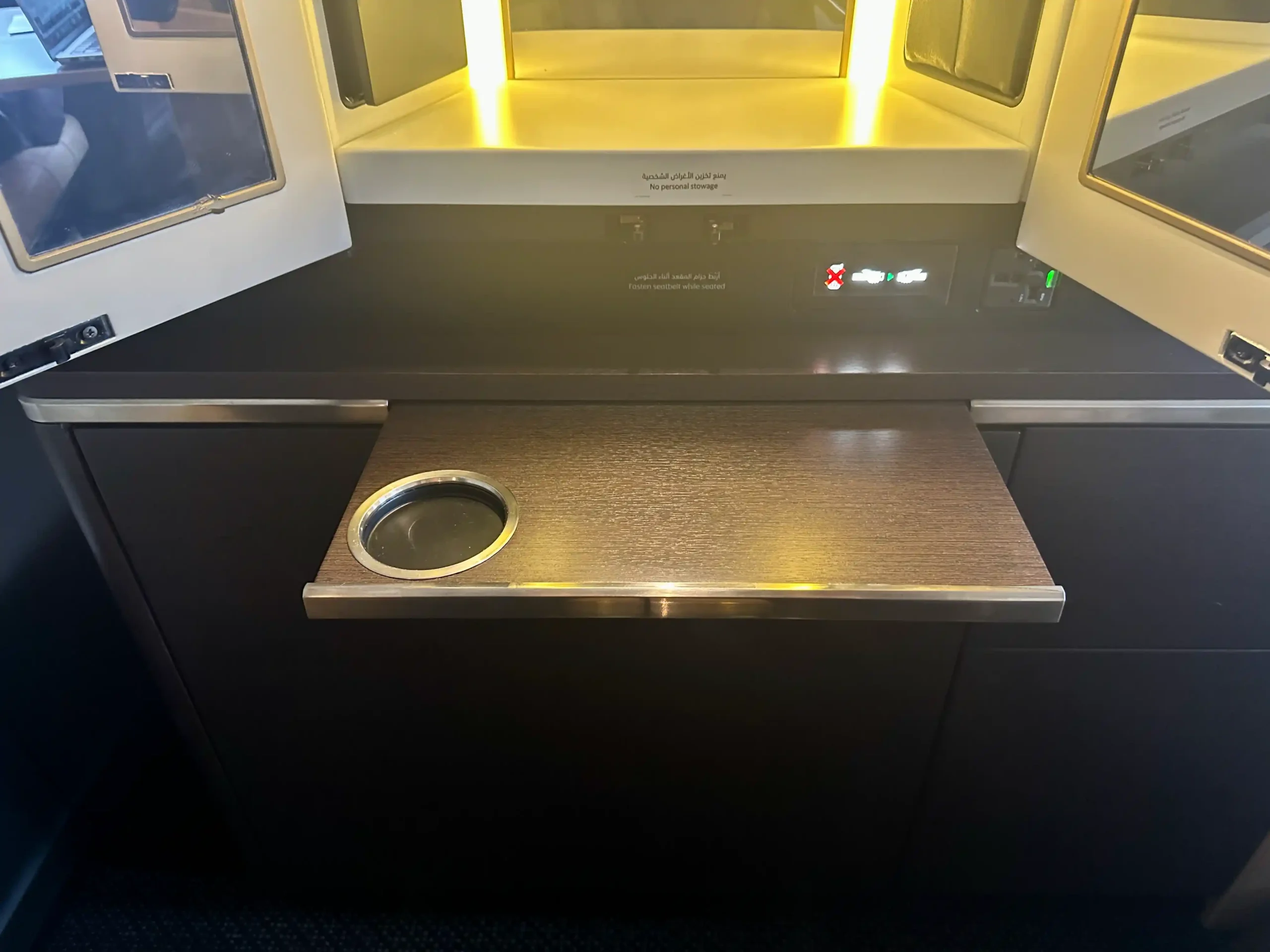 a counter with a tray and a drink holder