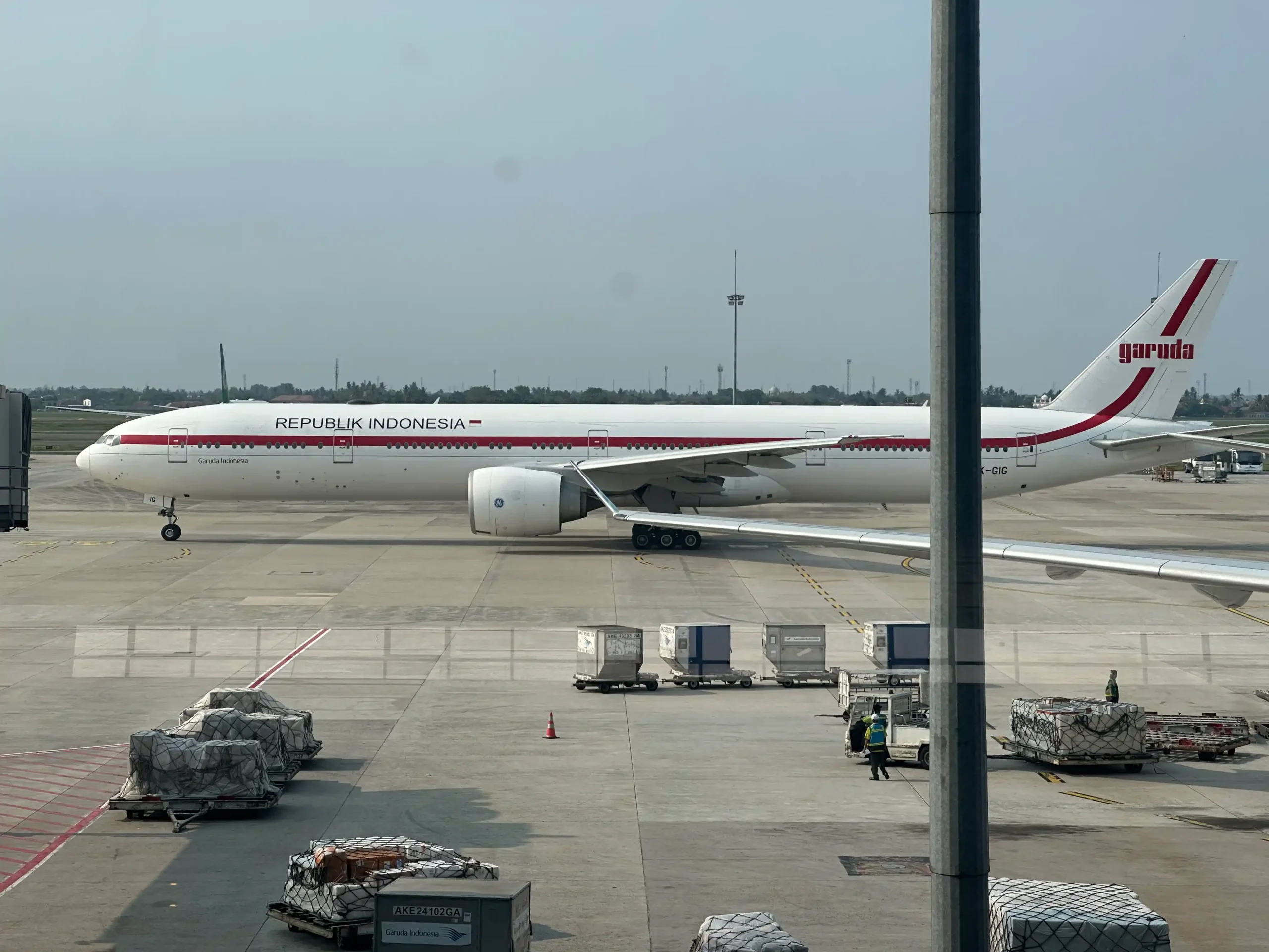 a large white airplane on a tarmac