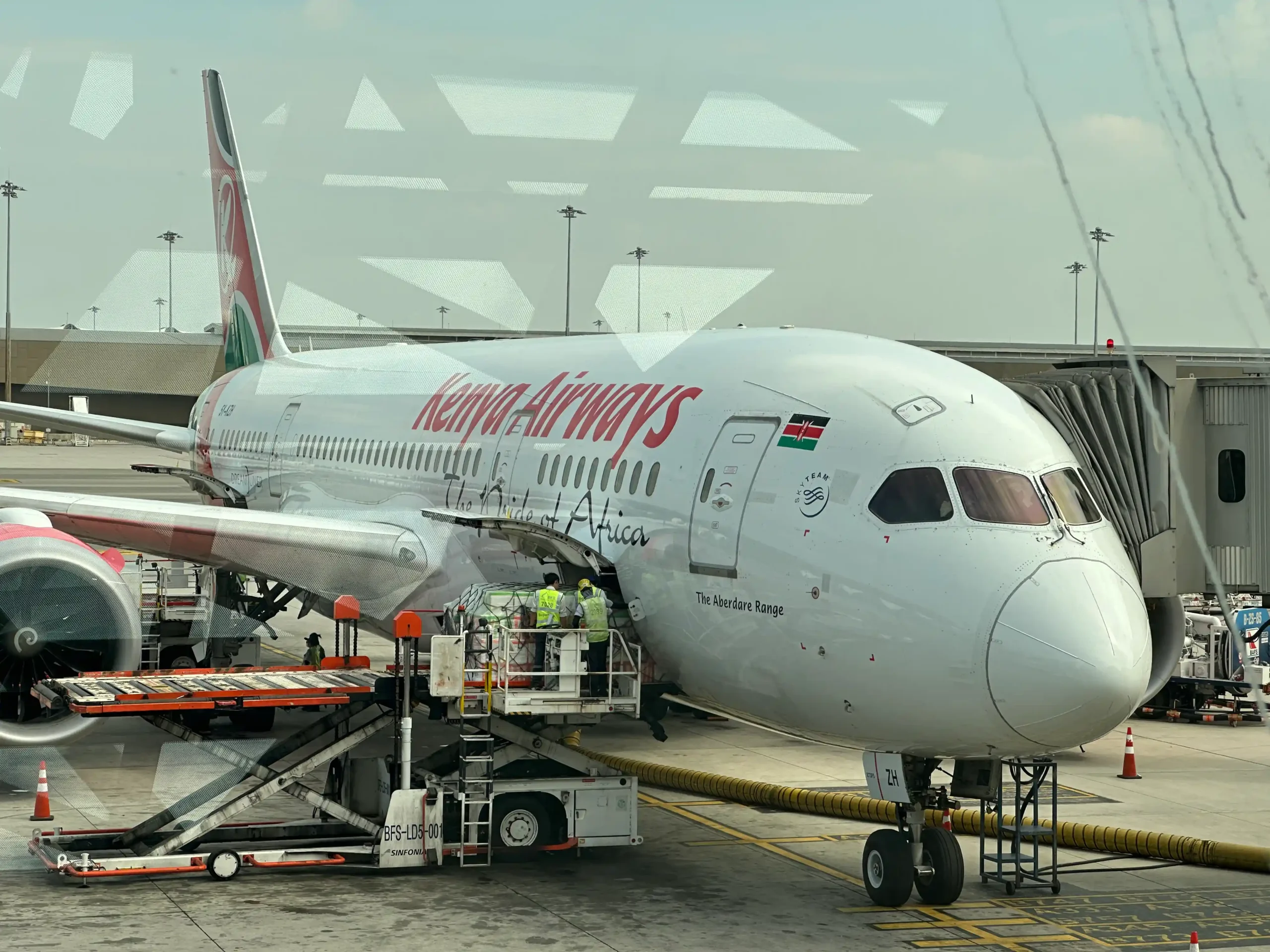 a plane being loaded with passengers