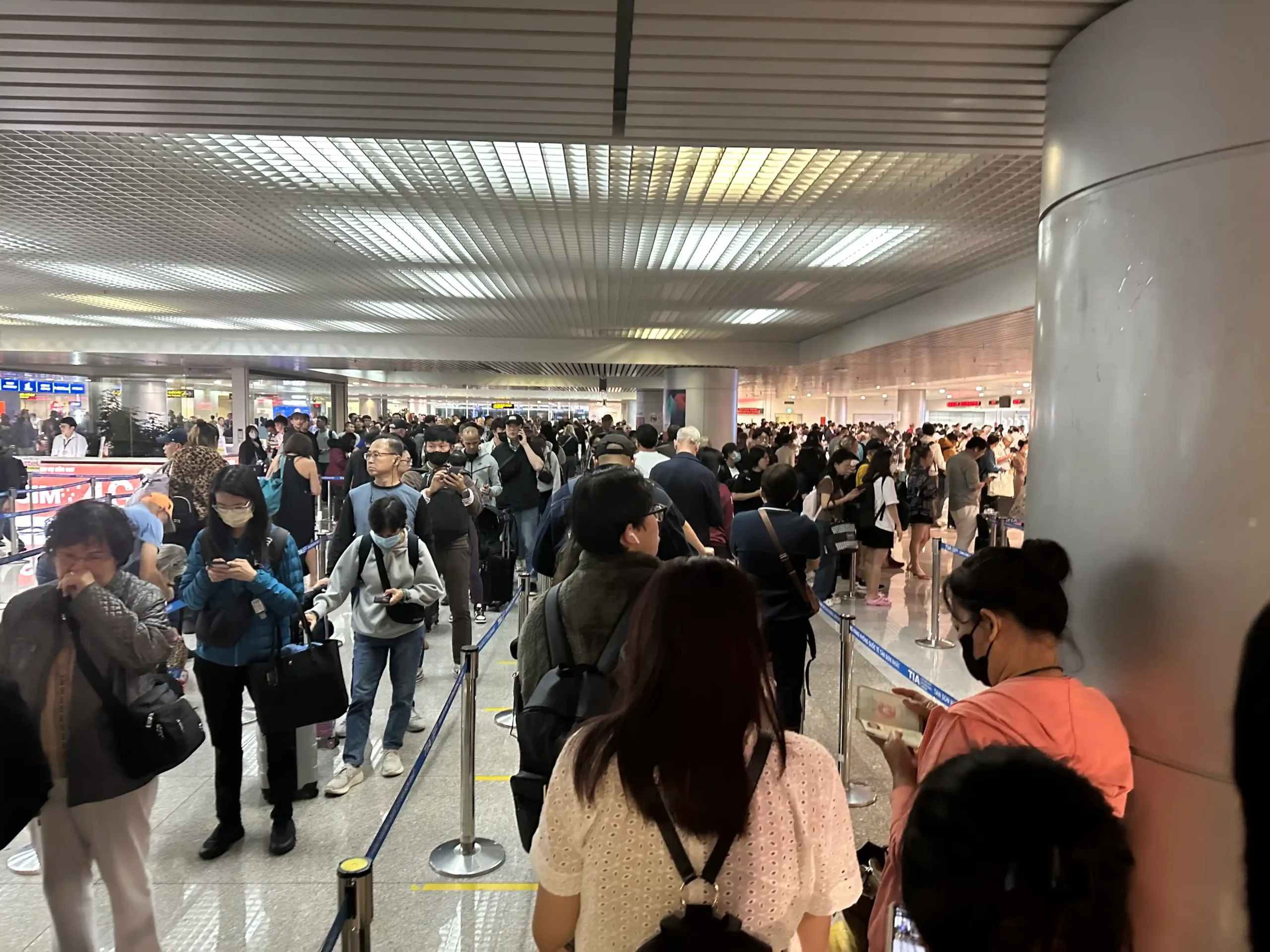 a group of people in a terminal