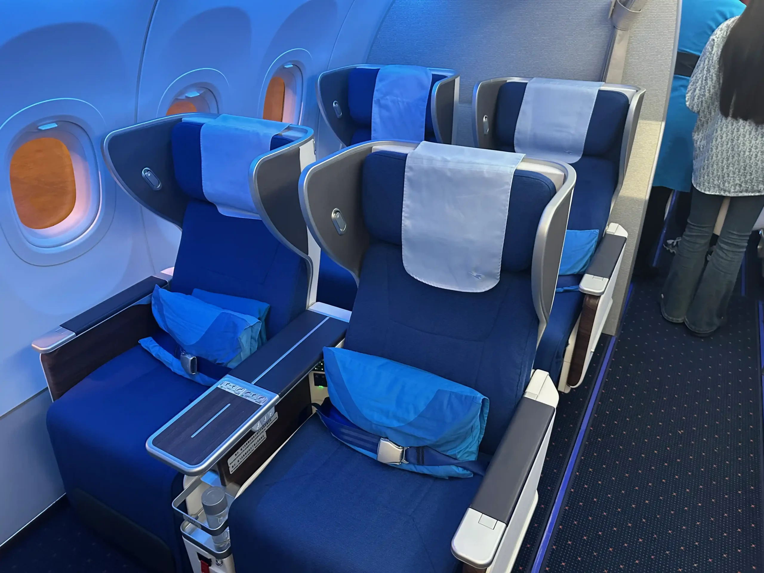 a blue and white airplane seats